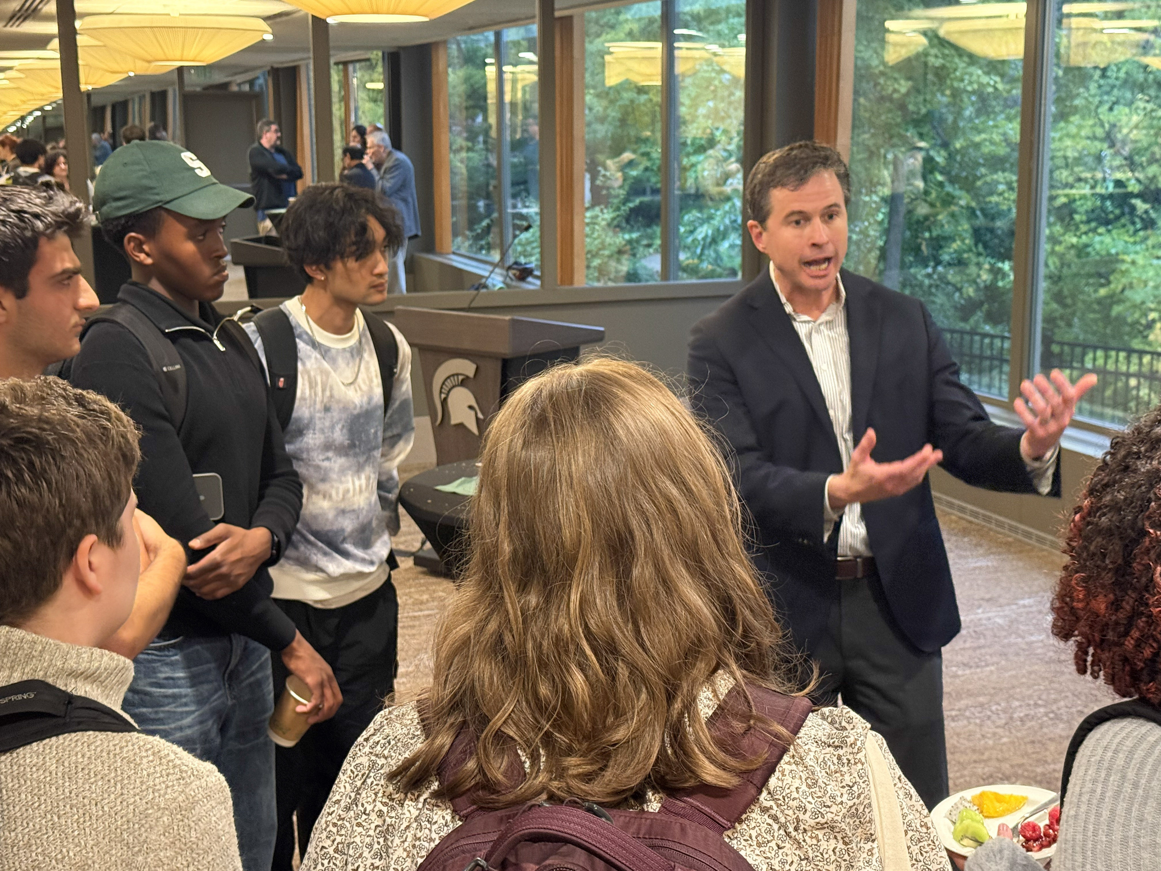 Nyhan discusses issues with students