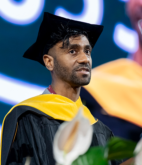 Sociology Assistant Professor PJ Pettis emphasizes pride and resilience in his commencement speech as Outstanding Teacher 